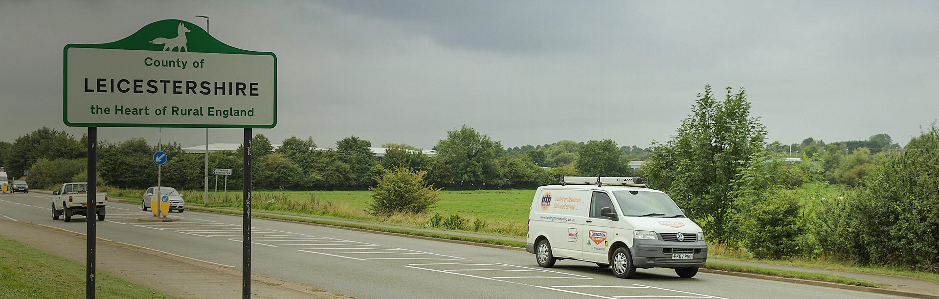 White plumbers van driving into Leicestershire